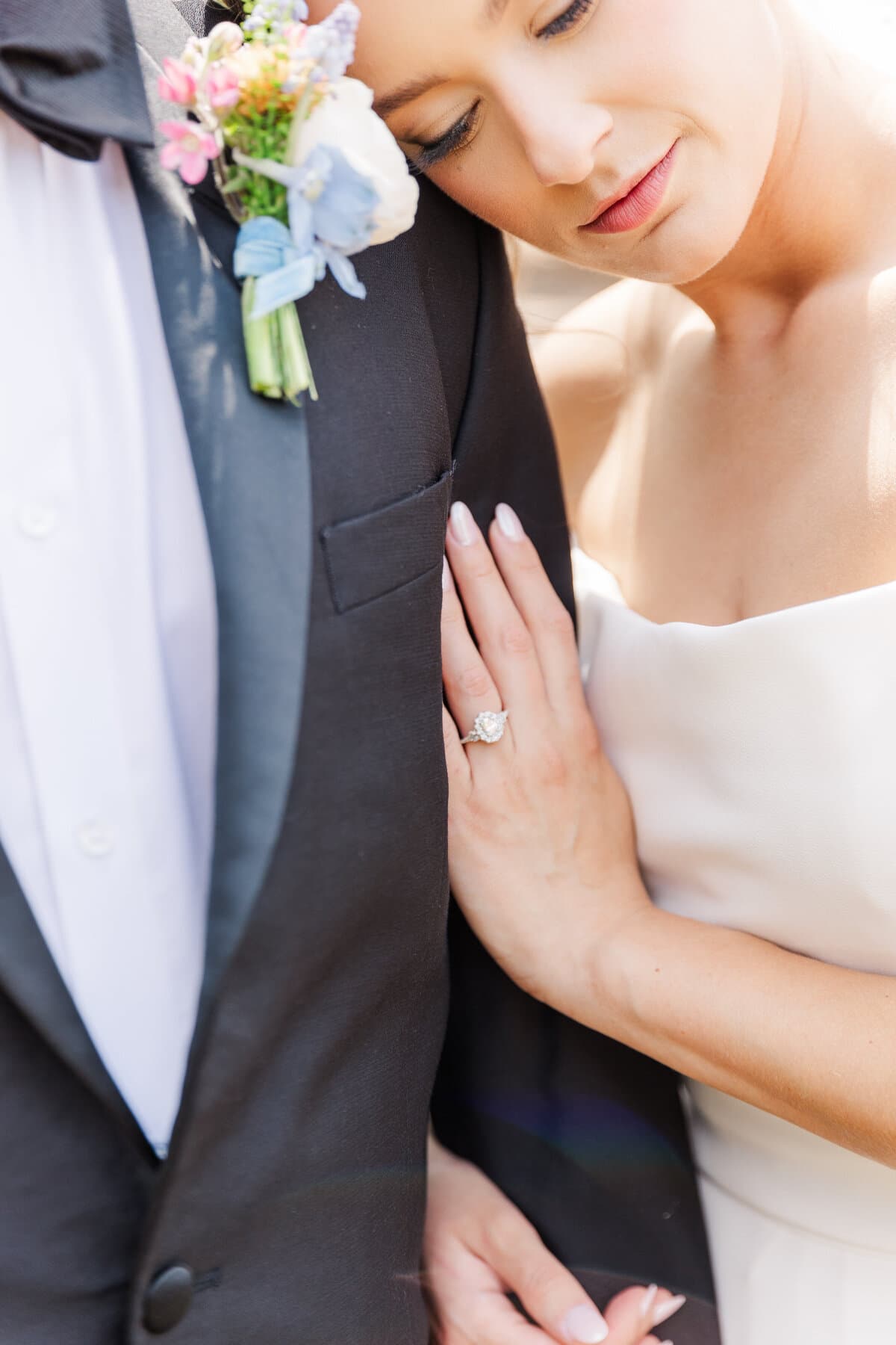 Close wedding-day portrait of a bride and groom
