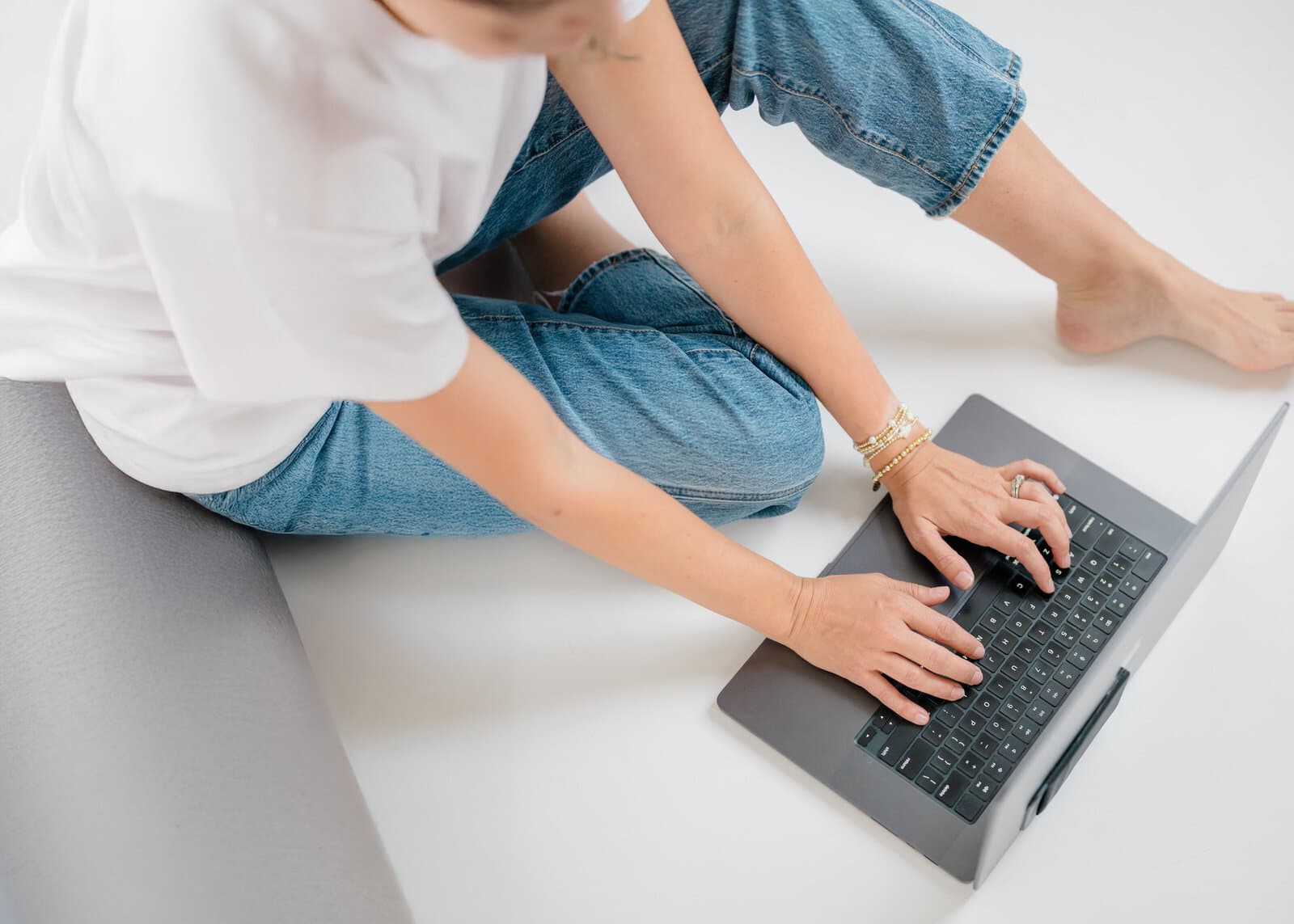 Jennie working on her laptop